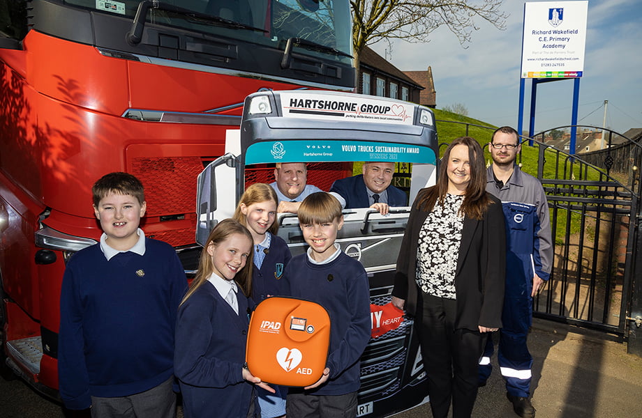 Primary school receives heart defibrillator donated by staff at vehicle distributor