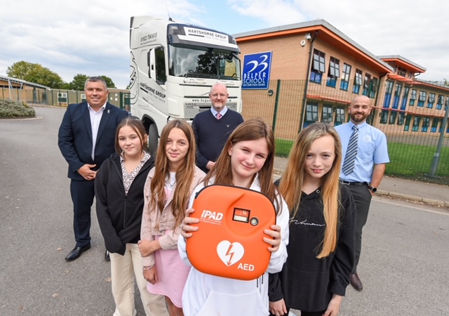 School in Belper receives life-saving heart defibrillator from former pupil