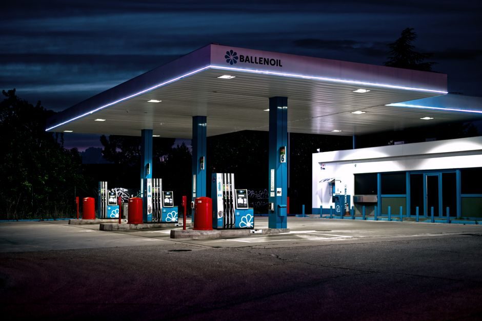 Used vans lined up on a forecourt
