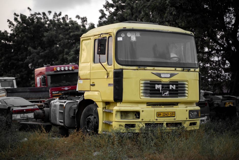 Used vehicles lined up at an auction site