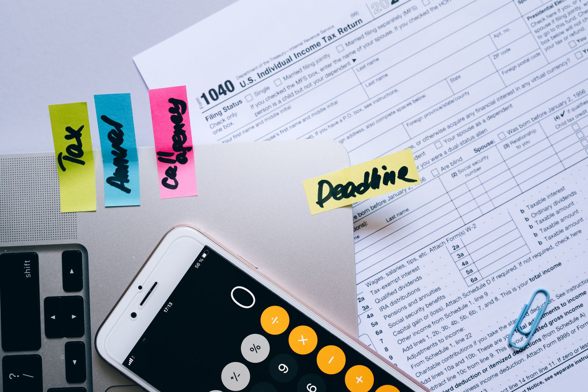 Sticky notes on a desk reading tax, VAT and deadline