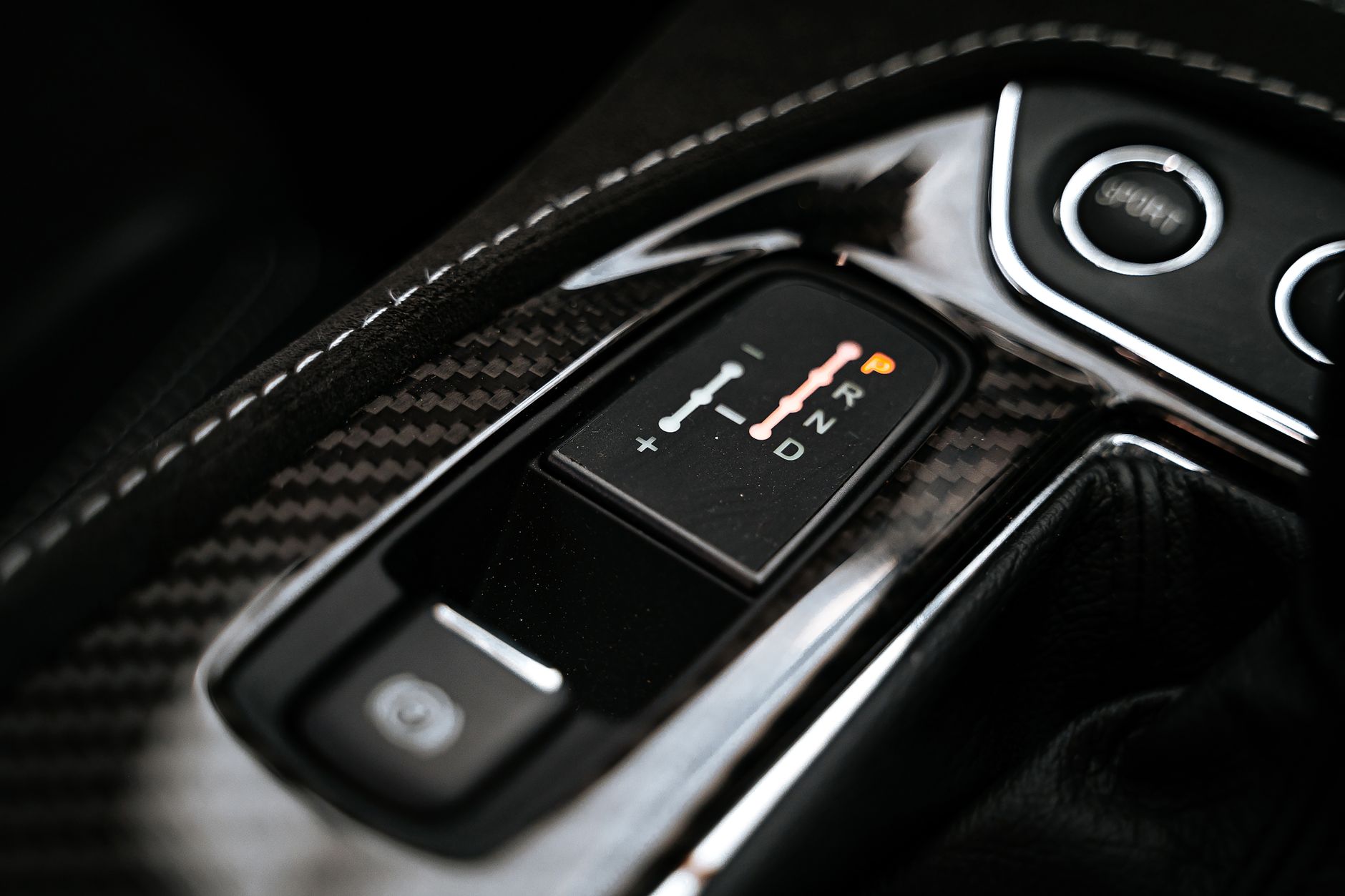Close view of an automatic gear selector resting in the park position