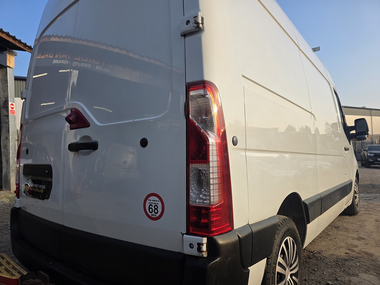Rear three-quarter view of a Vauxhall Movano on our own forecourt showing its length
