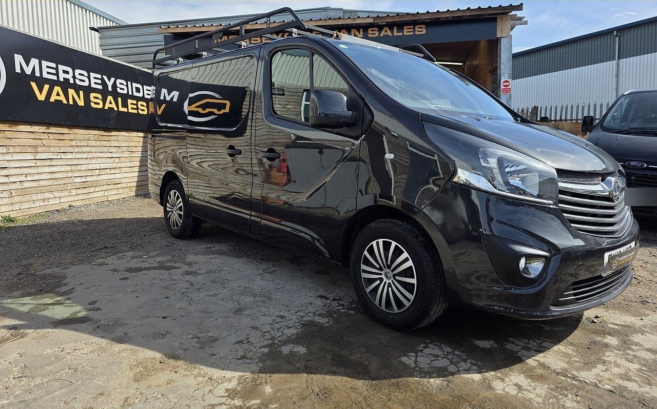 Black Vauxhall Vivaro medium panel van photographed on our own forecourt