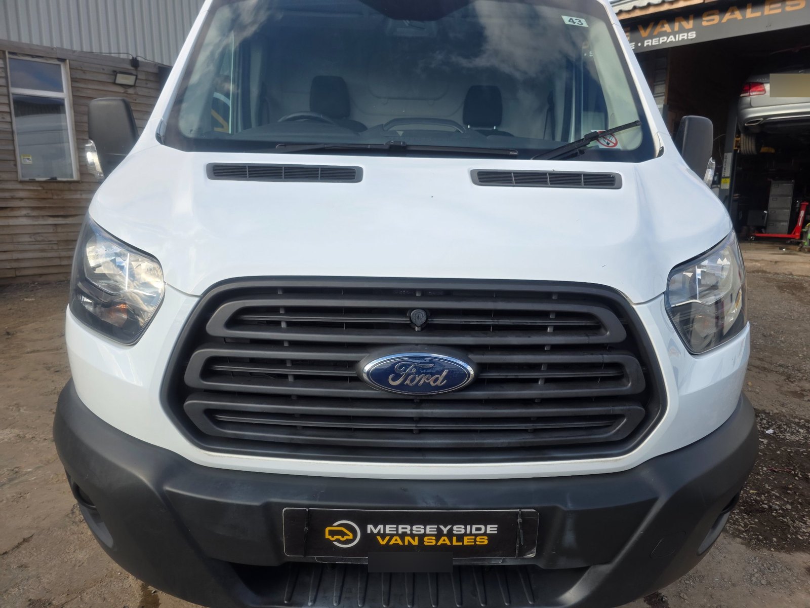 A full-size Ford Transit panel van photographed on our own forecourt