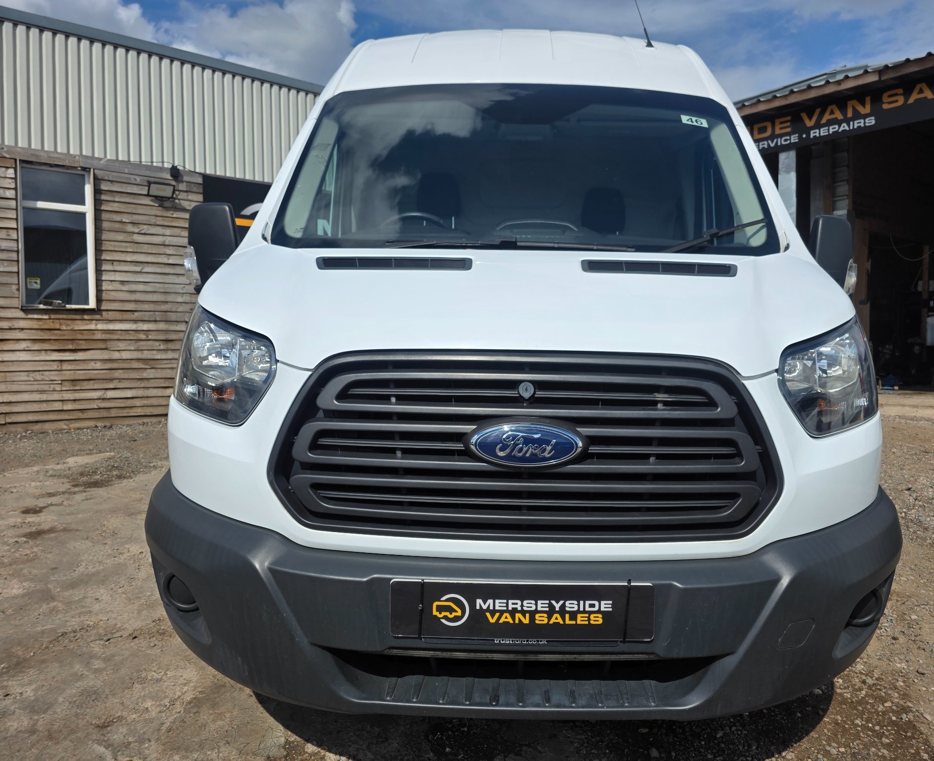 Ford Transit high-roof panel van pictured head-on at our forecourt