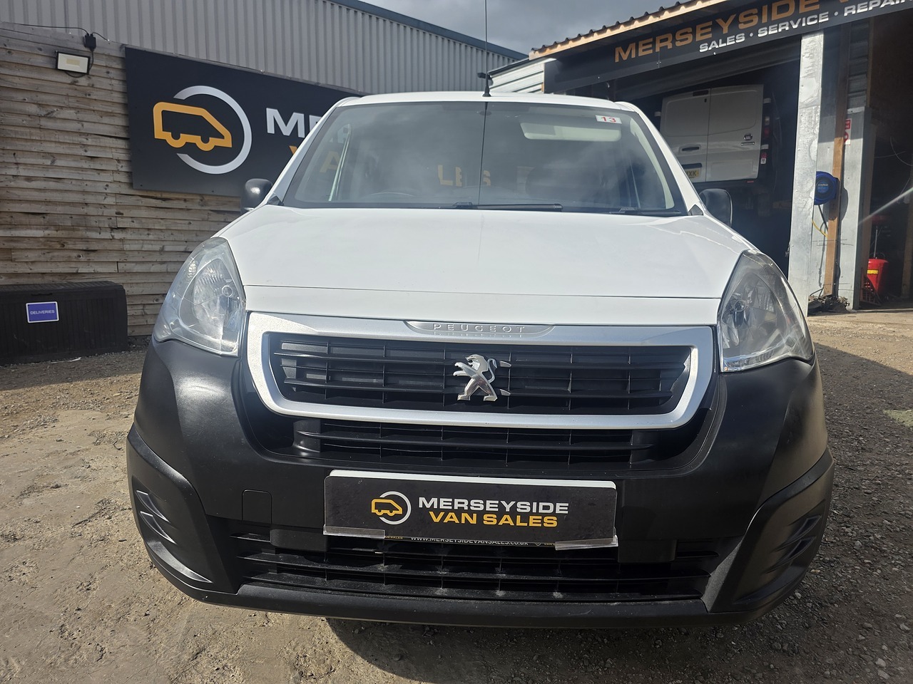 Peugeot Partner combi van photographed head-on at our sales site