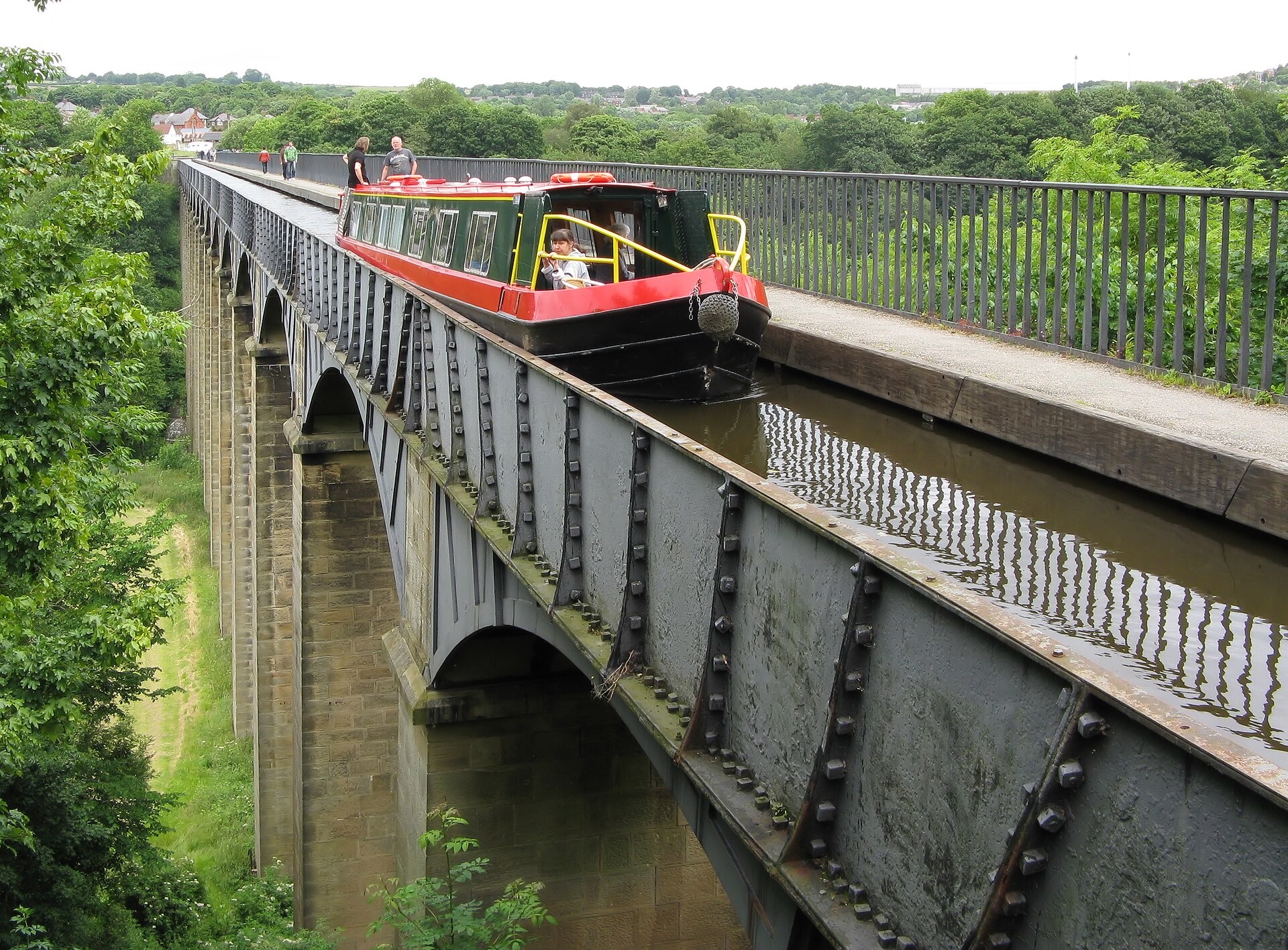 A narrowboat crossing the Pontcysyllte Aqueduct high above the Dee valley