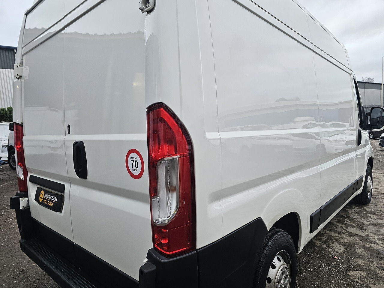 Peugeot Boxer large panel van seen from the rear three-quarter on our yard