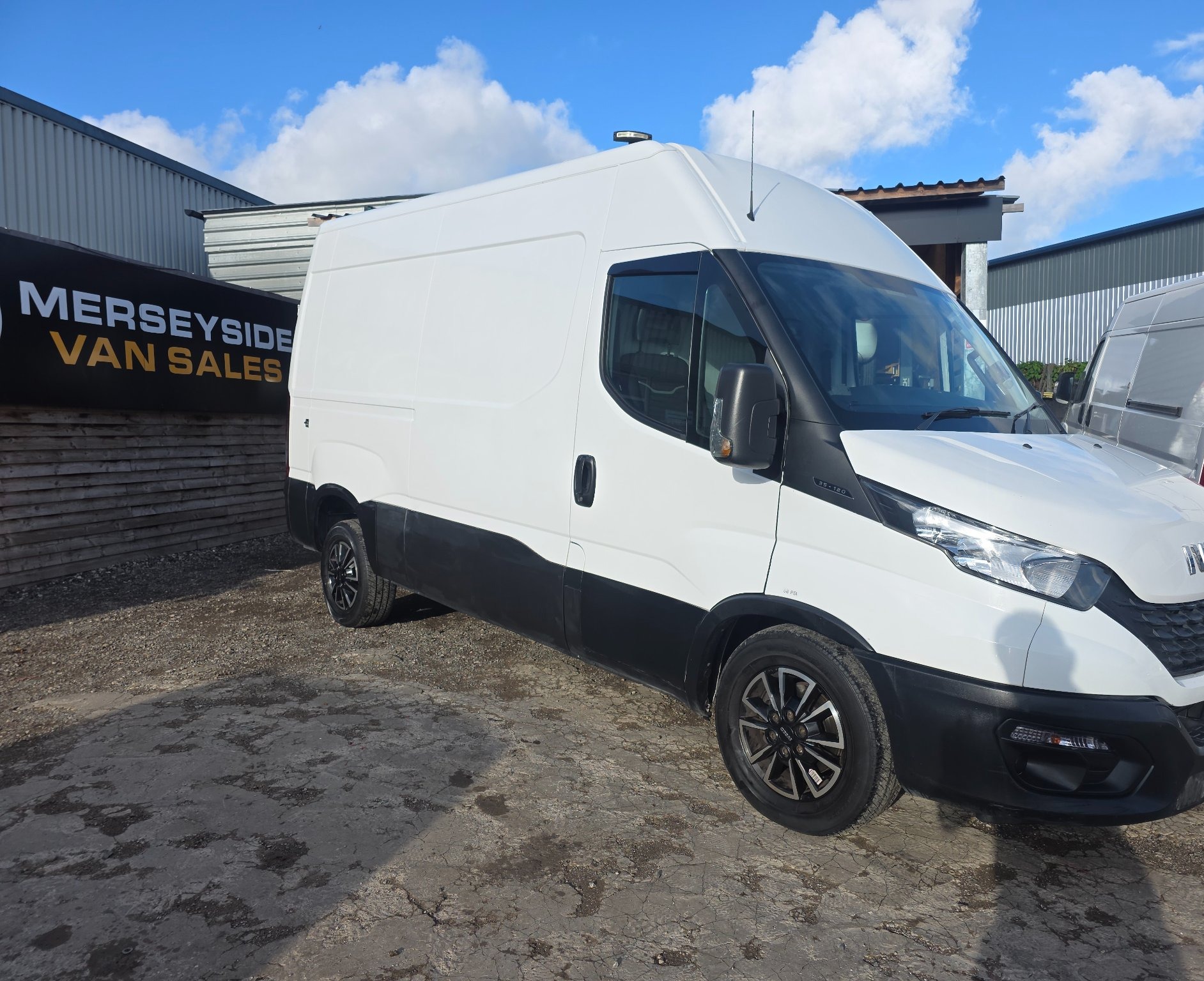 Iveco Daily high-roof panel van parked beside our sales office