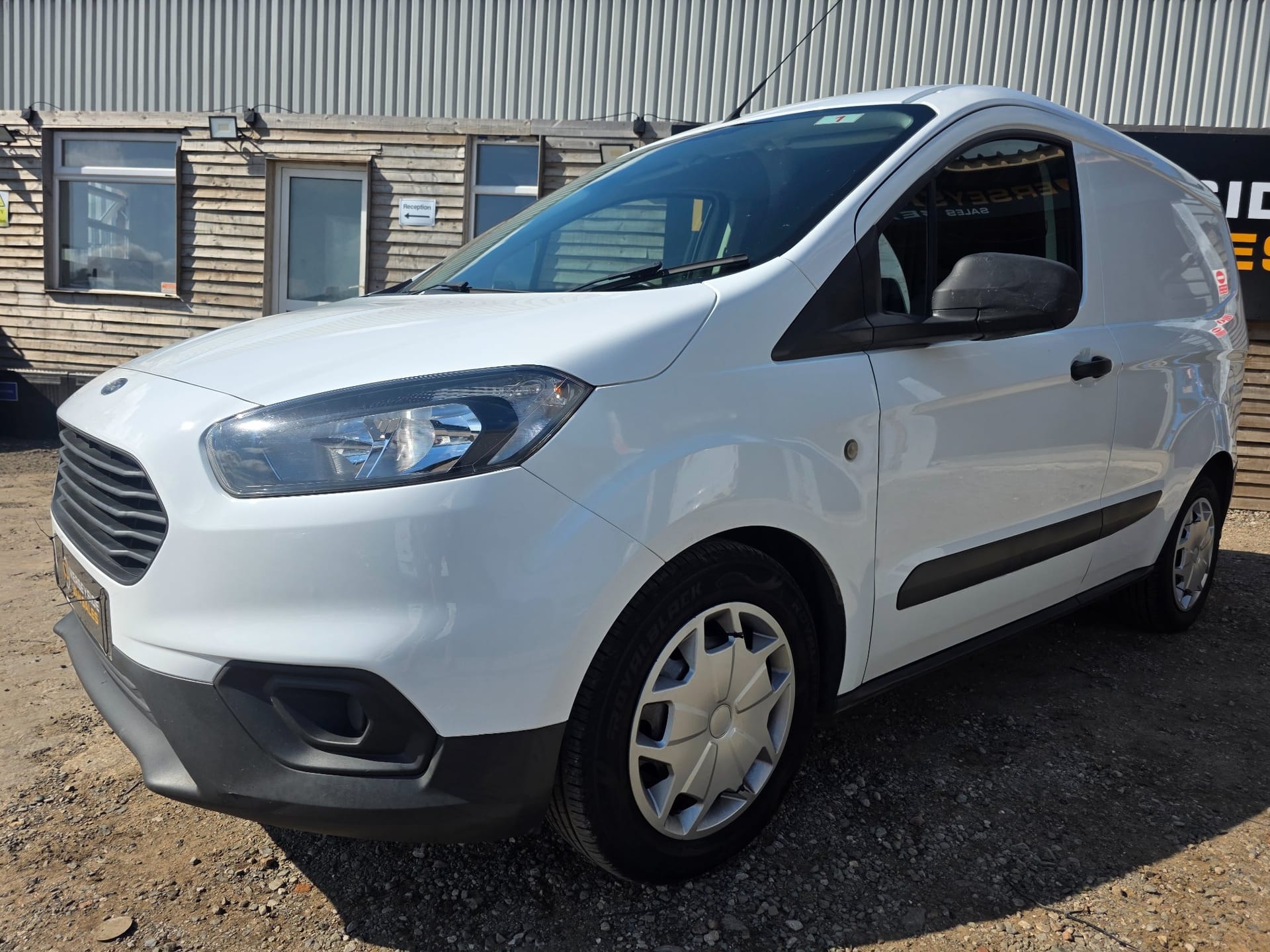 Ford Transit Courier small van photographed at the front of our site