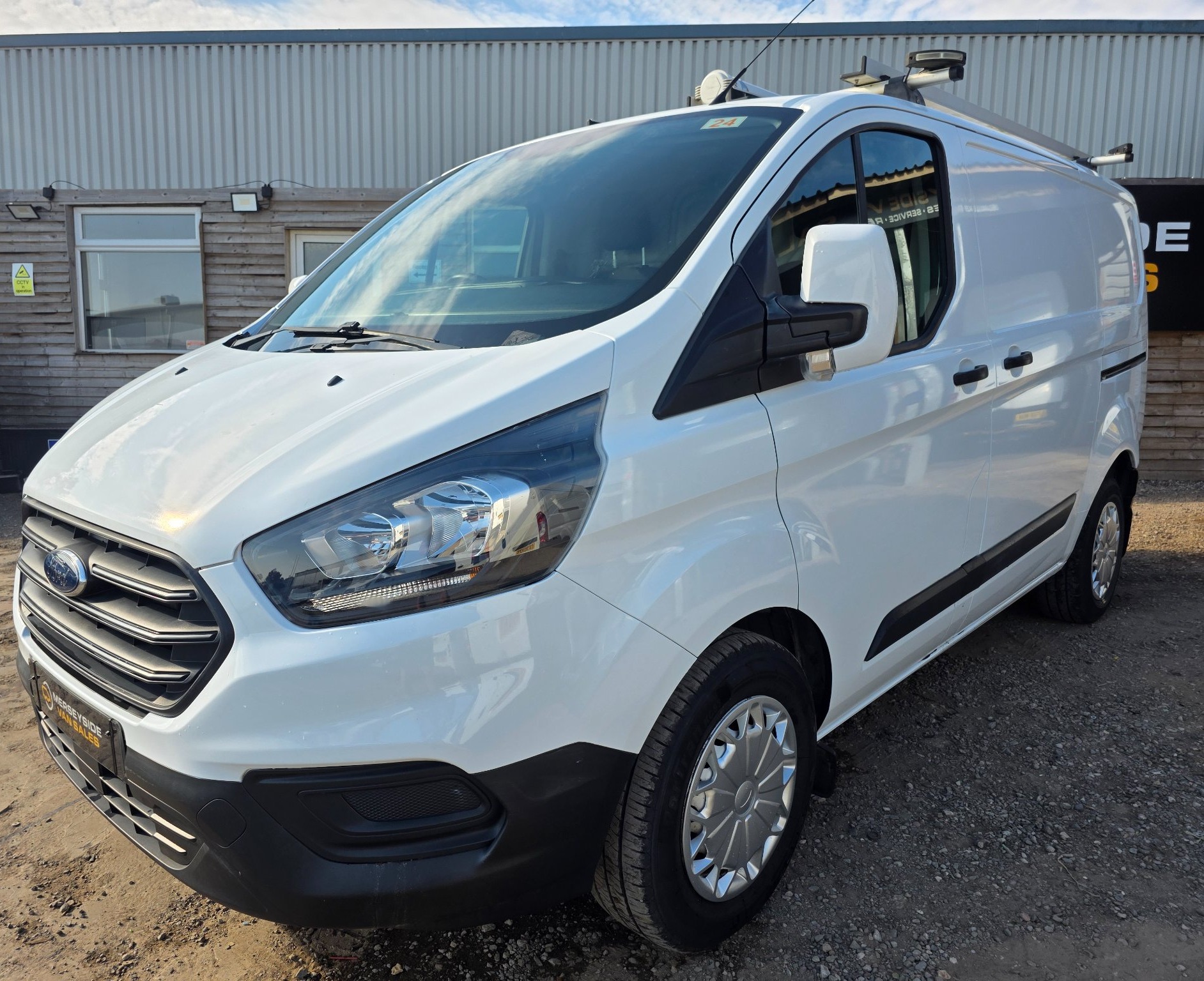 Ford Transit Custom panel van on our forecourt in low winter sun