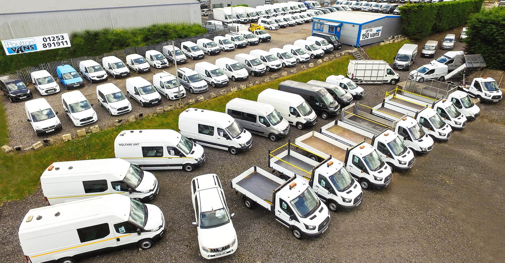 Vans For Sale Lined Up At Poulton Vans Premises - Poulton Vans & Car Sales Ltd