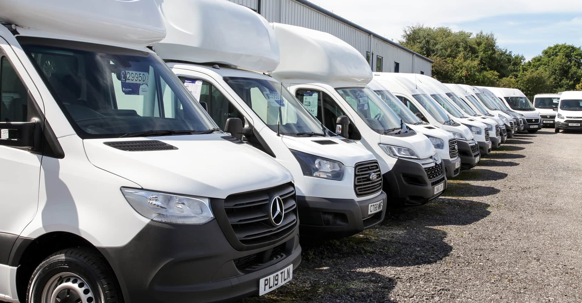 Vans For Sale Lined Up At Poulton Vans Premises 2 - Poulton Vans & Car Sales Ltd