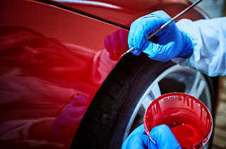 Professional Painting Of A Red Car On The Service - Rockpoint Limited